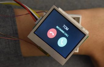 A Smartwatch Moving In Five Directions