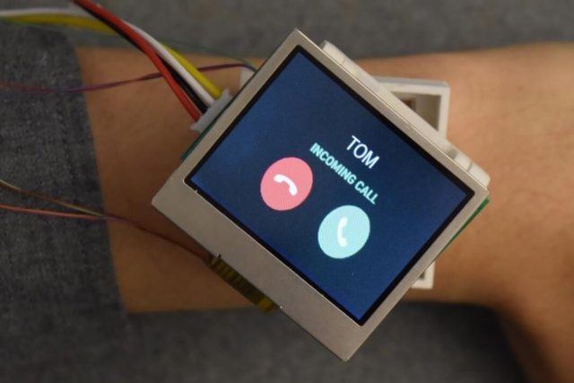 A Smartwatch Moving In Five Directions